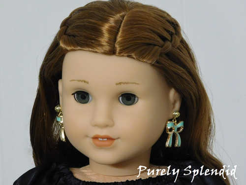 18 inch doll shown wearing a pair of Bow Earring Dangles and 2mm Studs
