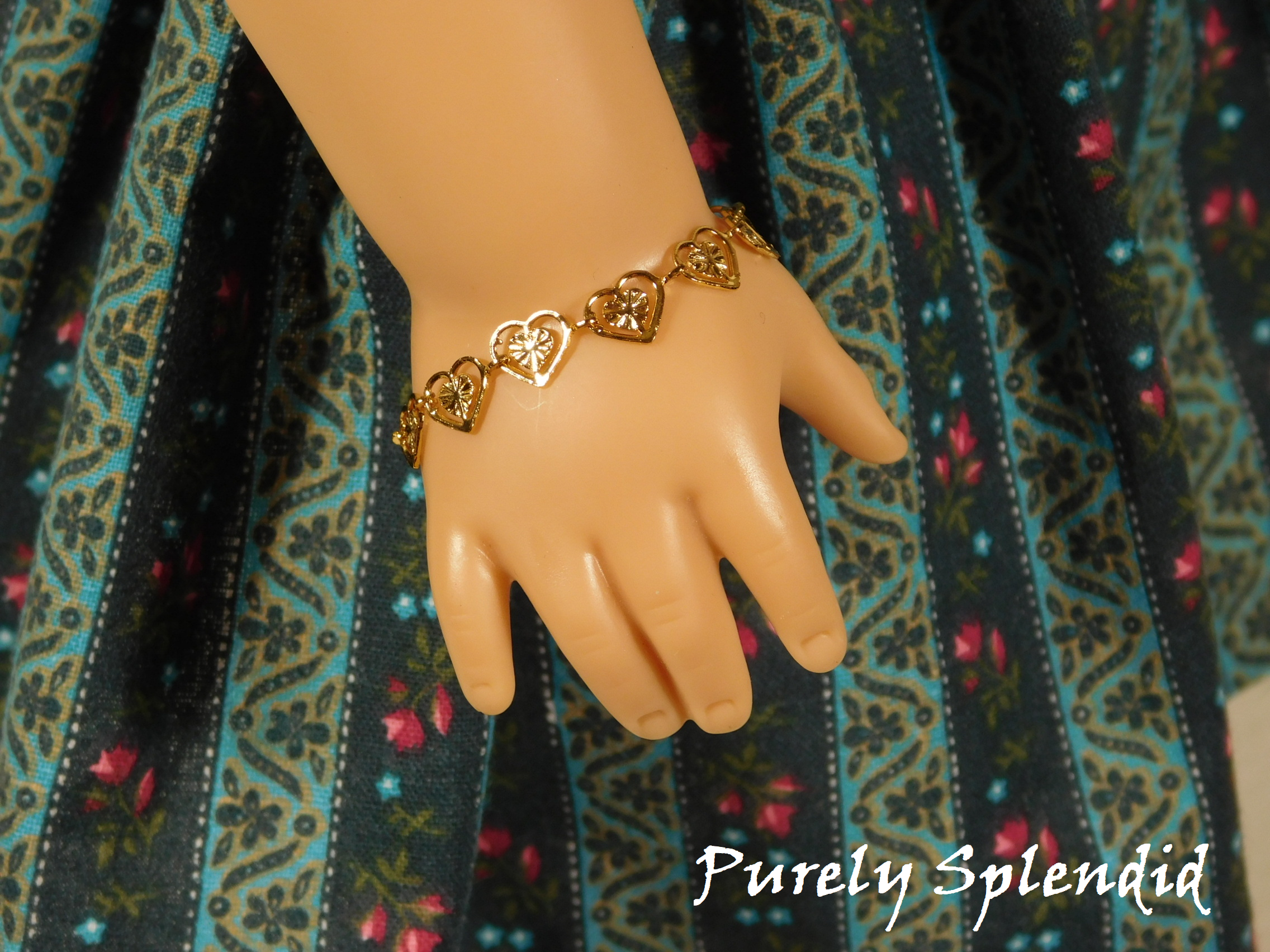 18 inch doll shown wearing a Lacy Heart Bracelet