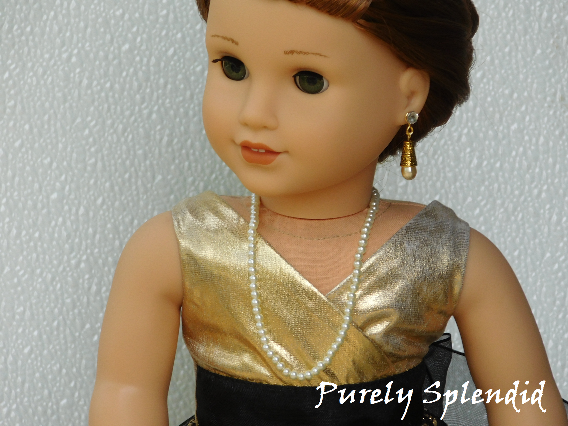 18" doll shown wearing the 10.5" long Pearl Necklace