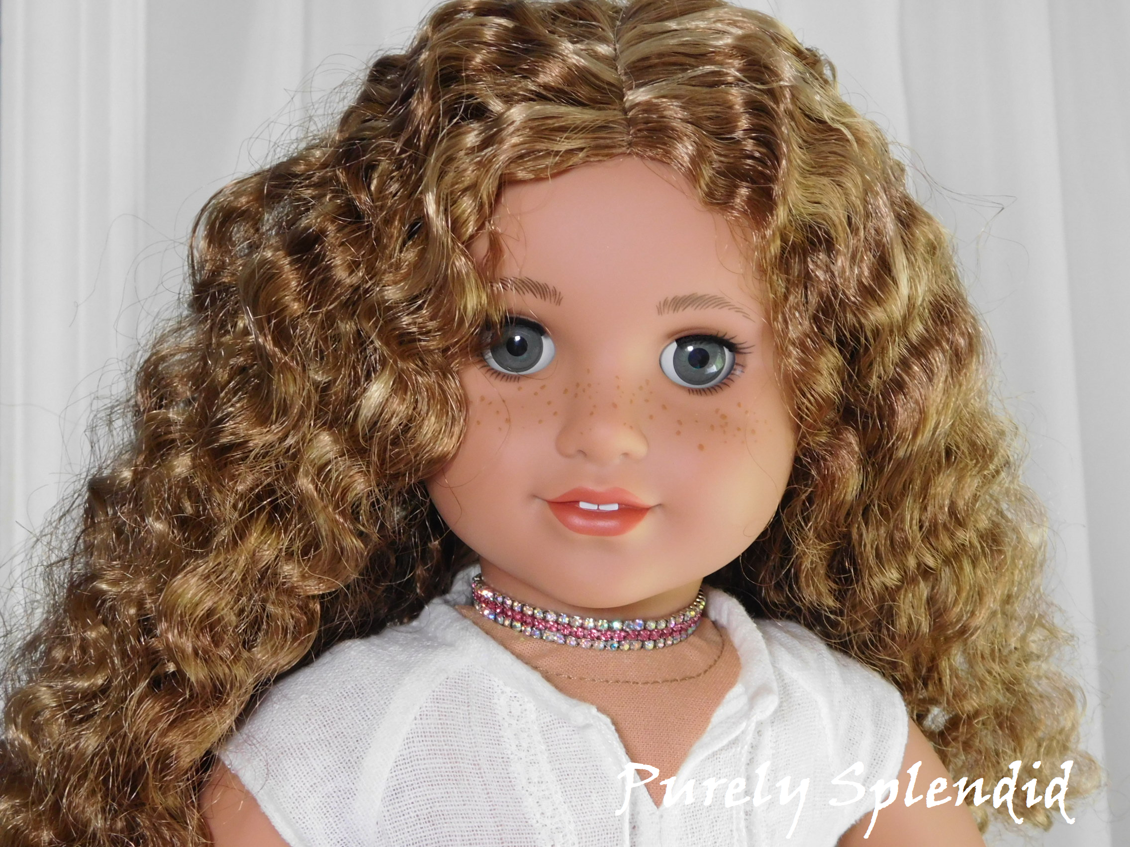 18 inch doll shown wearing a Pink Shimmer Choker Necklace - a row of Aurora Borealis rhinestones on either side of a row of pink rhinestones