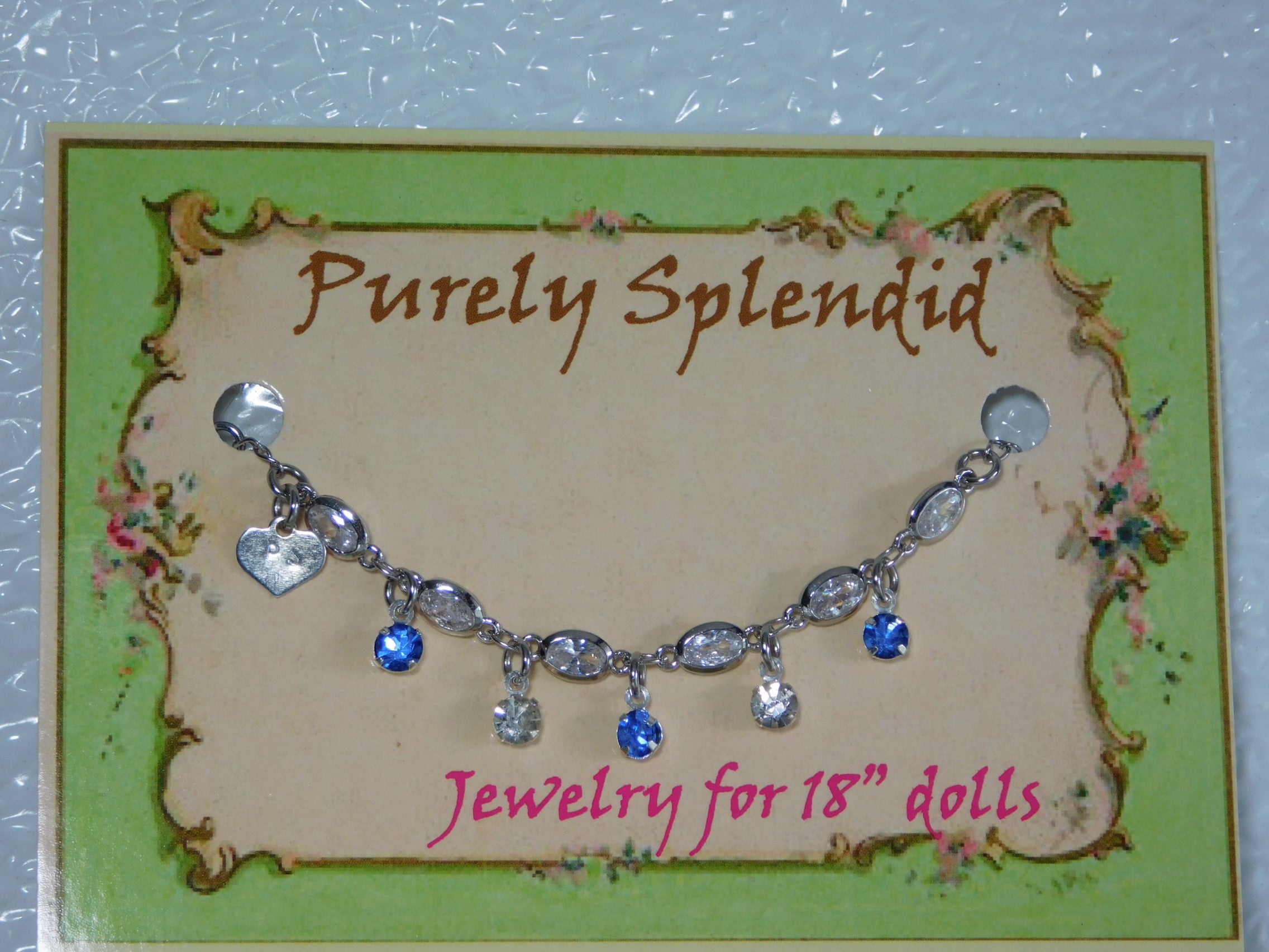 crystal bracelet with alternating light blue and clear crystals dangling