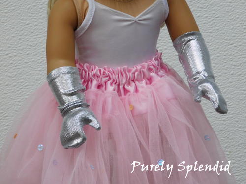 18 inch doll shown wearing a pair of long Silver Shimmer Gloves