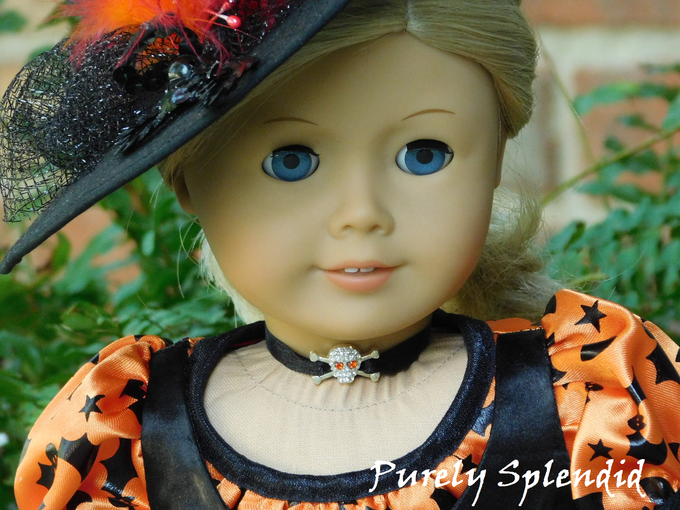 18 inch doll shown wearing Skull Choker with red eyes