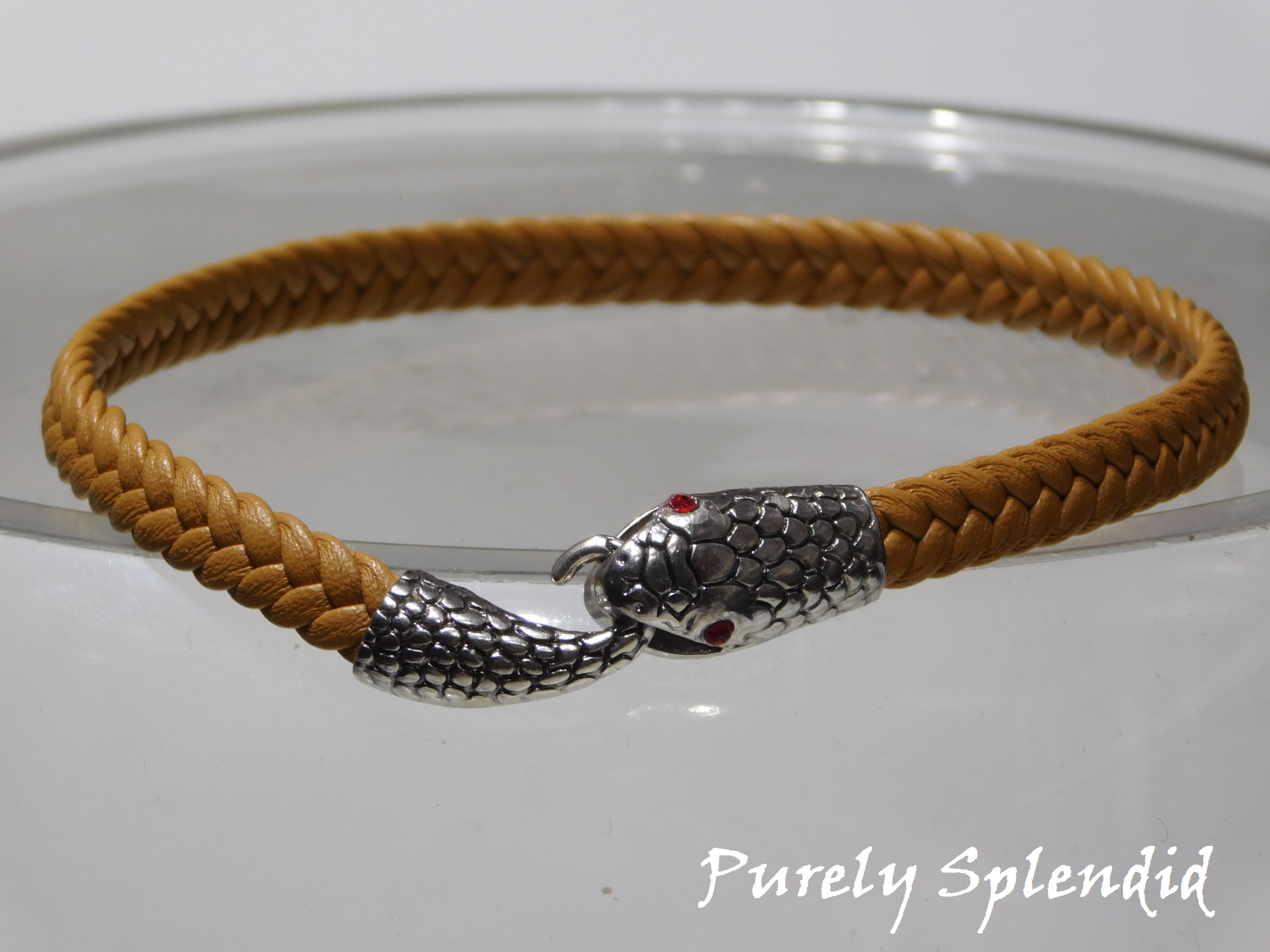 Tan braided belt with silver snake head- holding its tail which hooks into its mouth