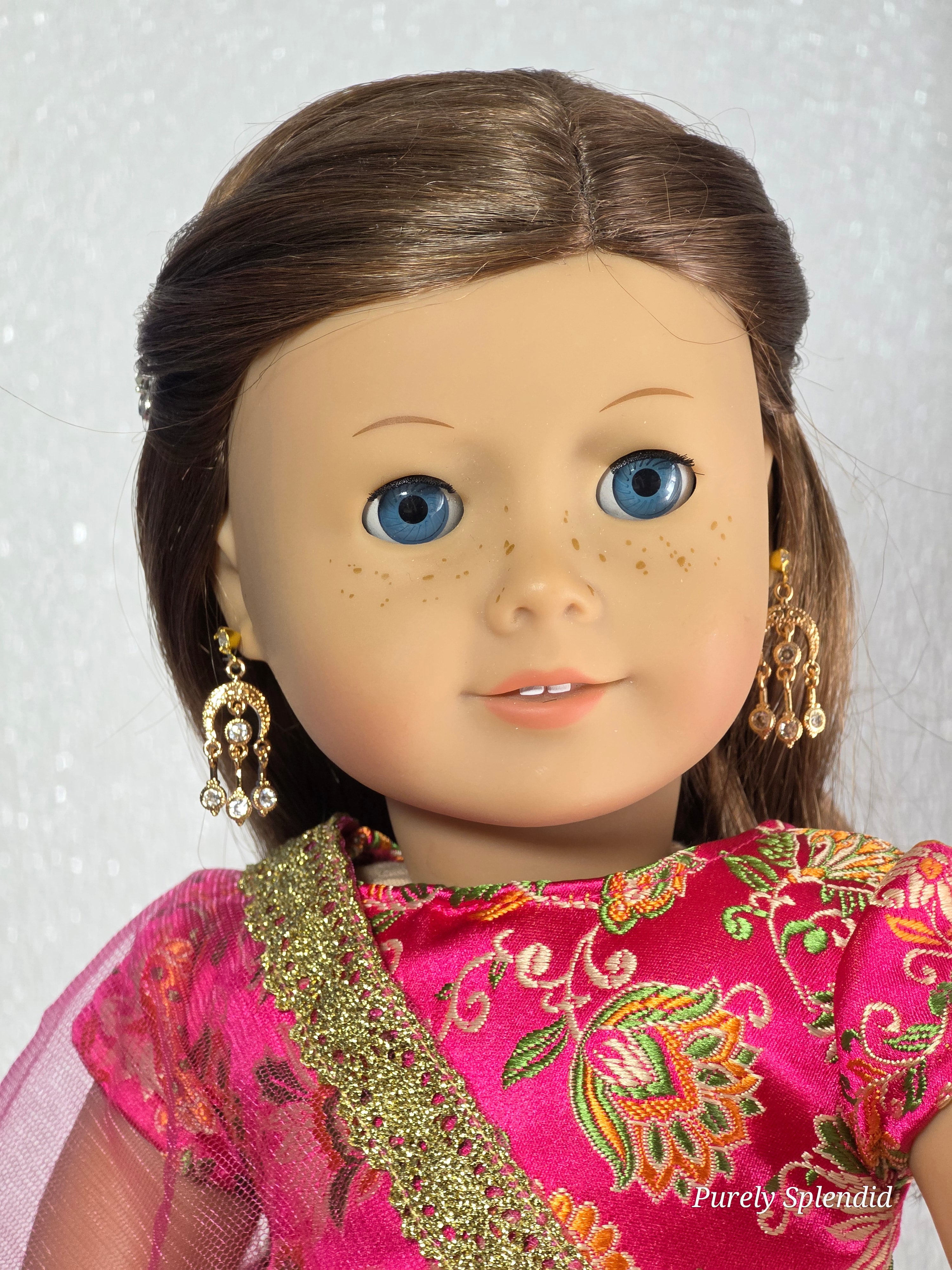 Gold Indian Earrings worn by an 18 inch doll