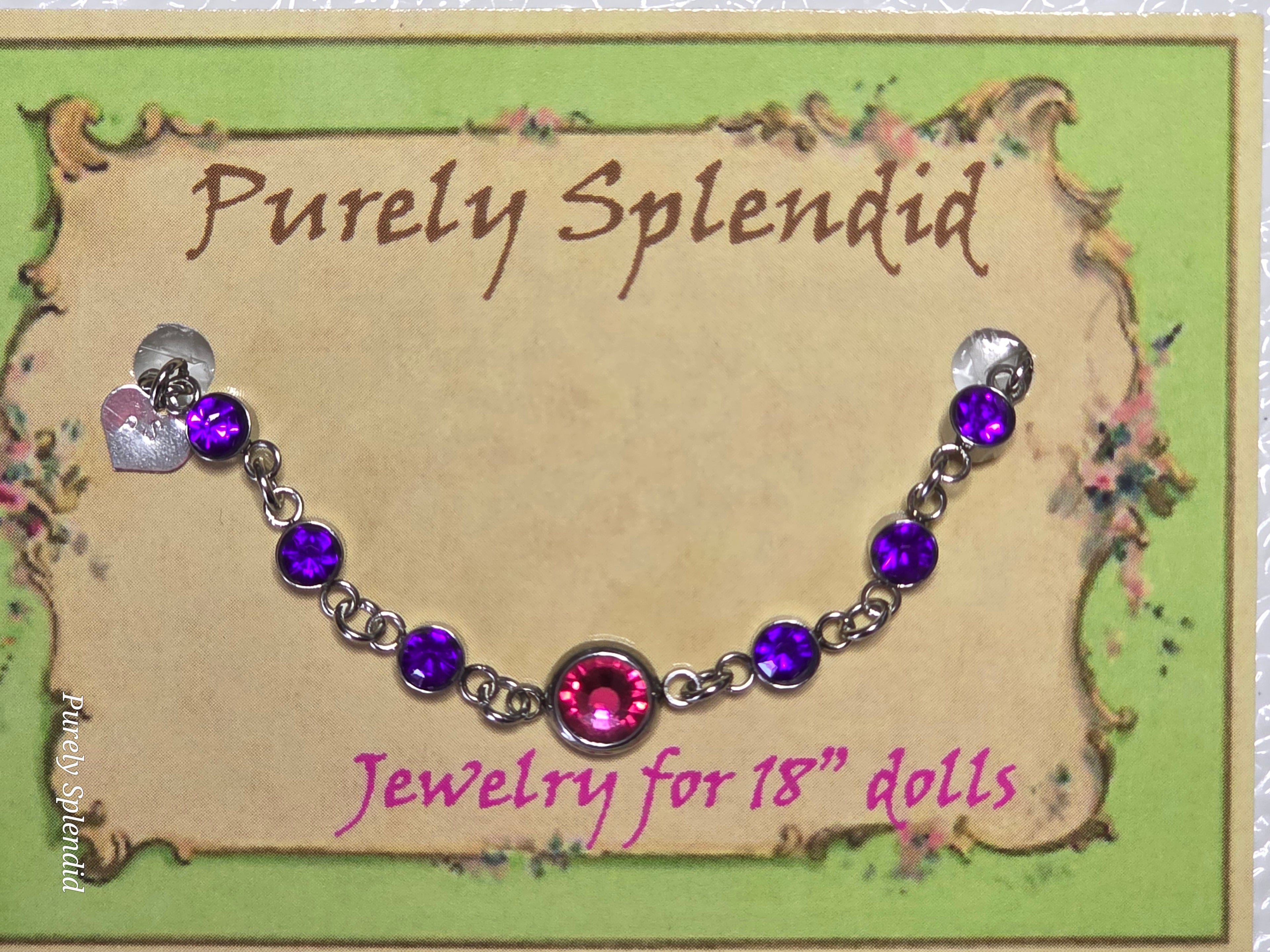 Dark Purple rhinestones surrounding a large Dark Pink center rhinestone