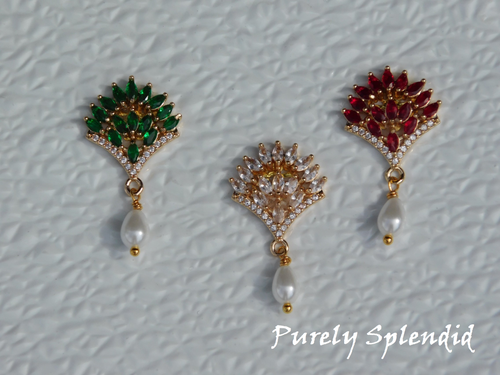 Dazzling Fan Brooch available in three colors -green, crystal and red