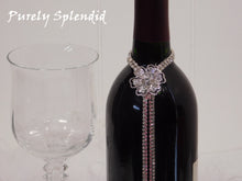 Load image into Gallery viewer, close up of the Sparkling Rhinestone Flower Bottle Bling on a standard wine bottle
