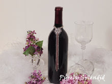 Load image into Gallery viewer, Sparkling Rhinestone Flower Bottle Bling with Pink Accents shown on the neck of a standard size wine bottle
