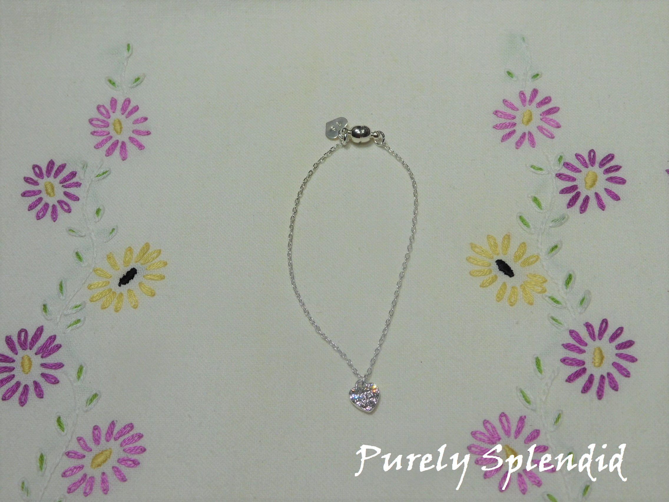 Dainty Silver Sparkling Heart Necklace for 18 inch dolls shown on a white background
