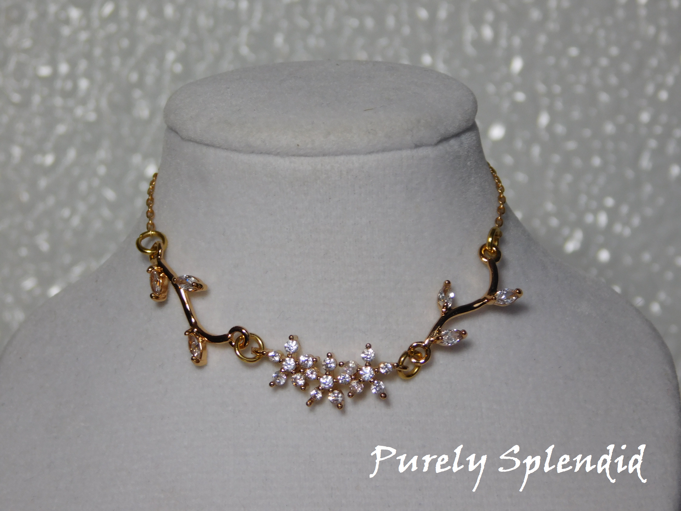 Three Sparkling Flowers with budding vines on either side