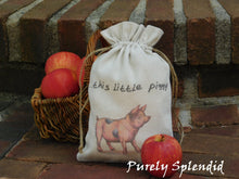 Load image into Gallery viewer, vintage style pink pig with the words ...this little piggy shown cinched up in front of a basket of apples
