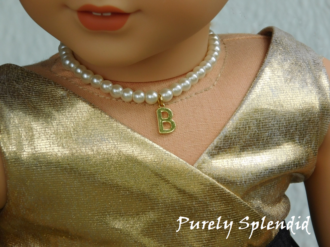 18 inch doll shown wearing a Pearl Necklace with a gold colored letter B