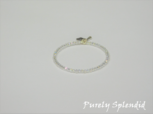 Small Aurora Borealis crystal beads make up this beautiful doll bracelet