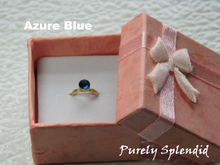 Load image into Gallery viewer, Azure Blue colored crystal on a gold band
