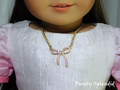 Birthday bow necklace for 18 inch girl dolls - gold plated cubic zirconia bow on pearl chain with magnetic clasp / Purely Splendid