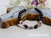 Load image into Gallery viewer, Black Lava beads, light pink crystals, silver accent beads and a touch of sparkle make up this Black Lava and Pink Bracelet for Girls. Closes with a Lobster Clasp and has an extender chain
