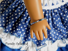 Load image into Gallery viewer, 18 inch doll shown wearing Sparkling Blue Stacking Bracelet 
