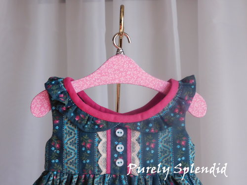Light pink floral fabric covered hanger for 18 inch girl doll closet American made | Purely Splendid
