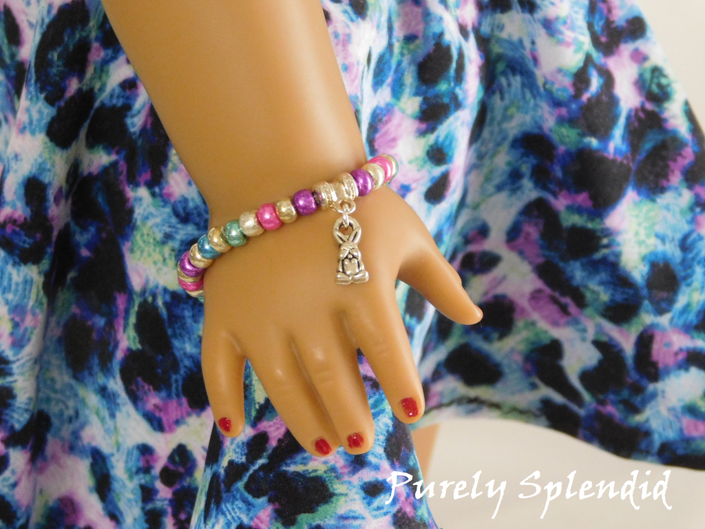 Colorful Easter Bunny Bracelet on 18 inch doll - metallic beads with silver bunny charm - magnetic clasp