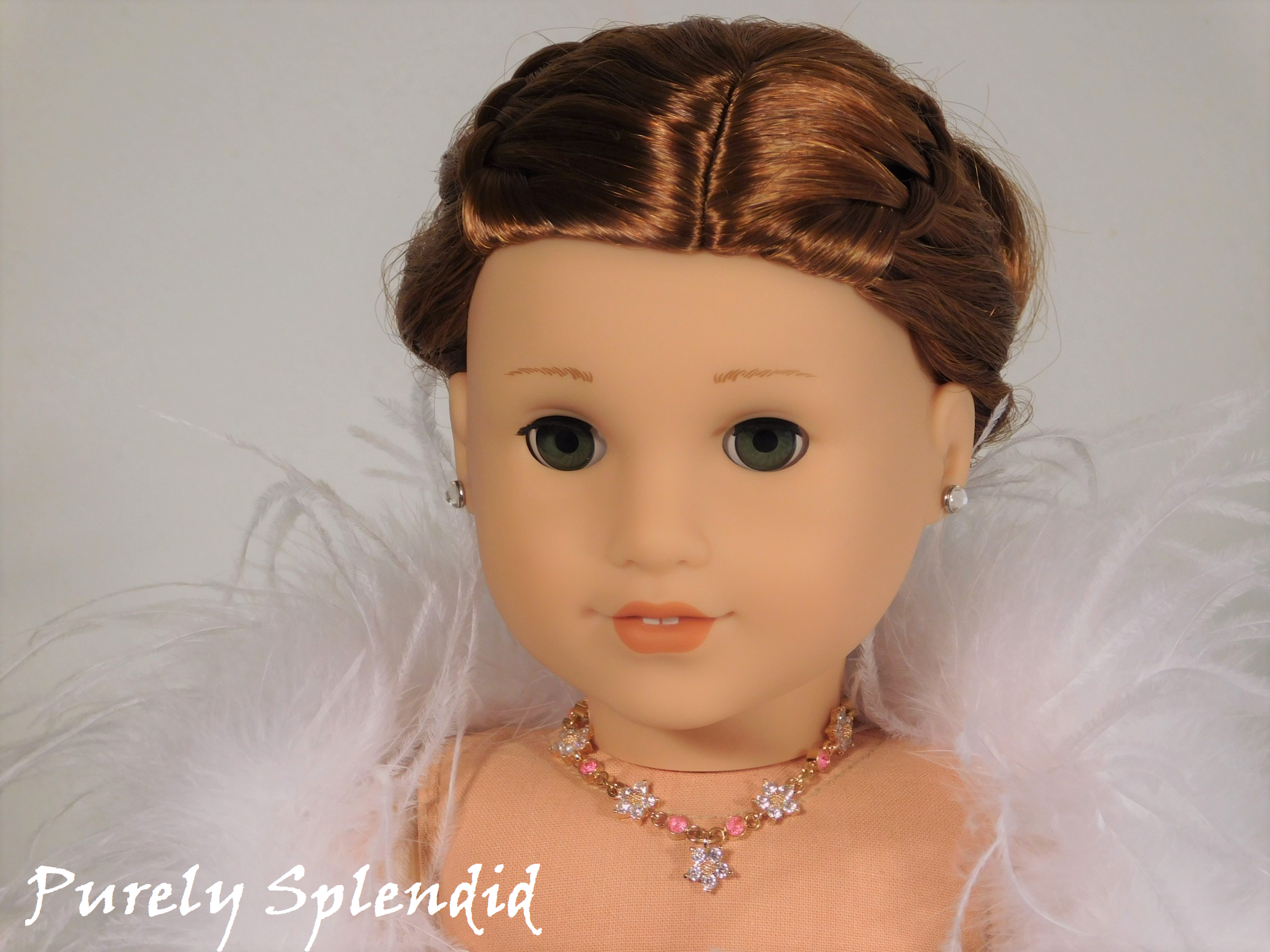 18 inch doll shown wearing a dark pink and crystal flower Create Your Own Sparkling Flower Necklace