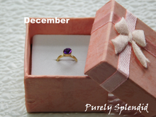 Load image into Gallery viewer, sparkling purple crystal on a gold band
