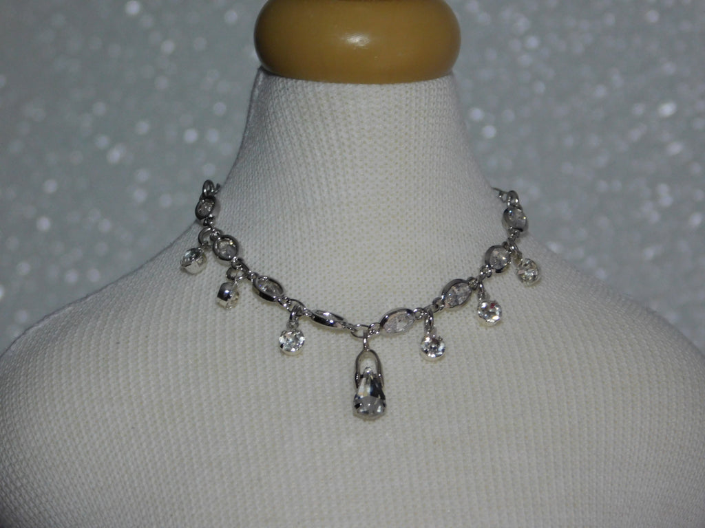 crystal necklace with crystal dangles and a large crystal teardrop center dangle
