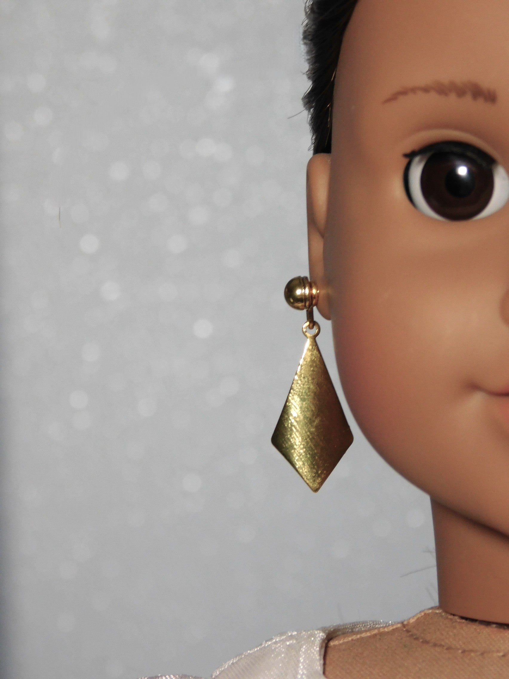 gold kite shaped earrings and gold 2mm stud earrings worn by an 18 inch doll / American made / Purely Splendid

