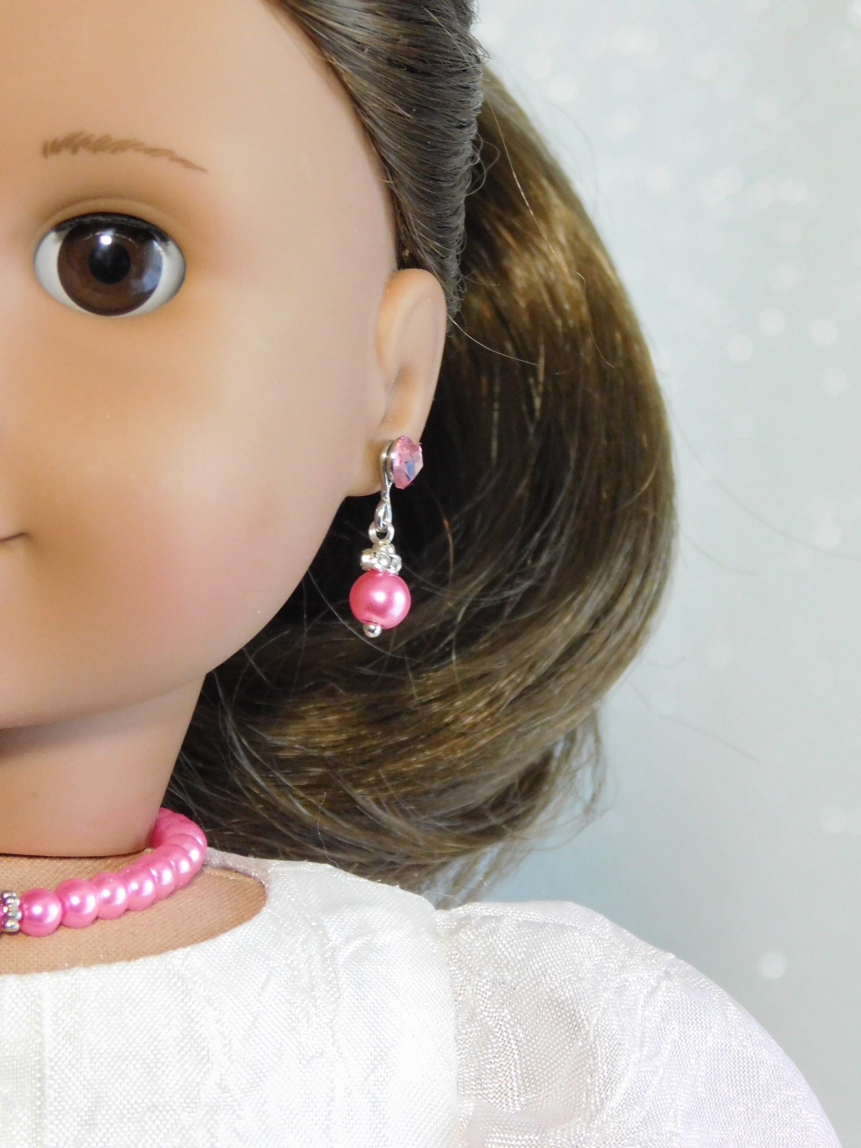 18 inch doll wearing sparkling pearl earrings with crystal studs - American made doll jewelry

