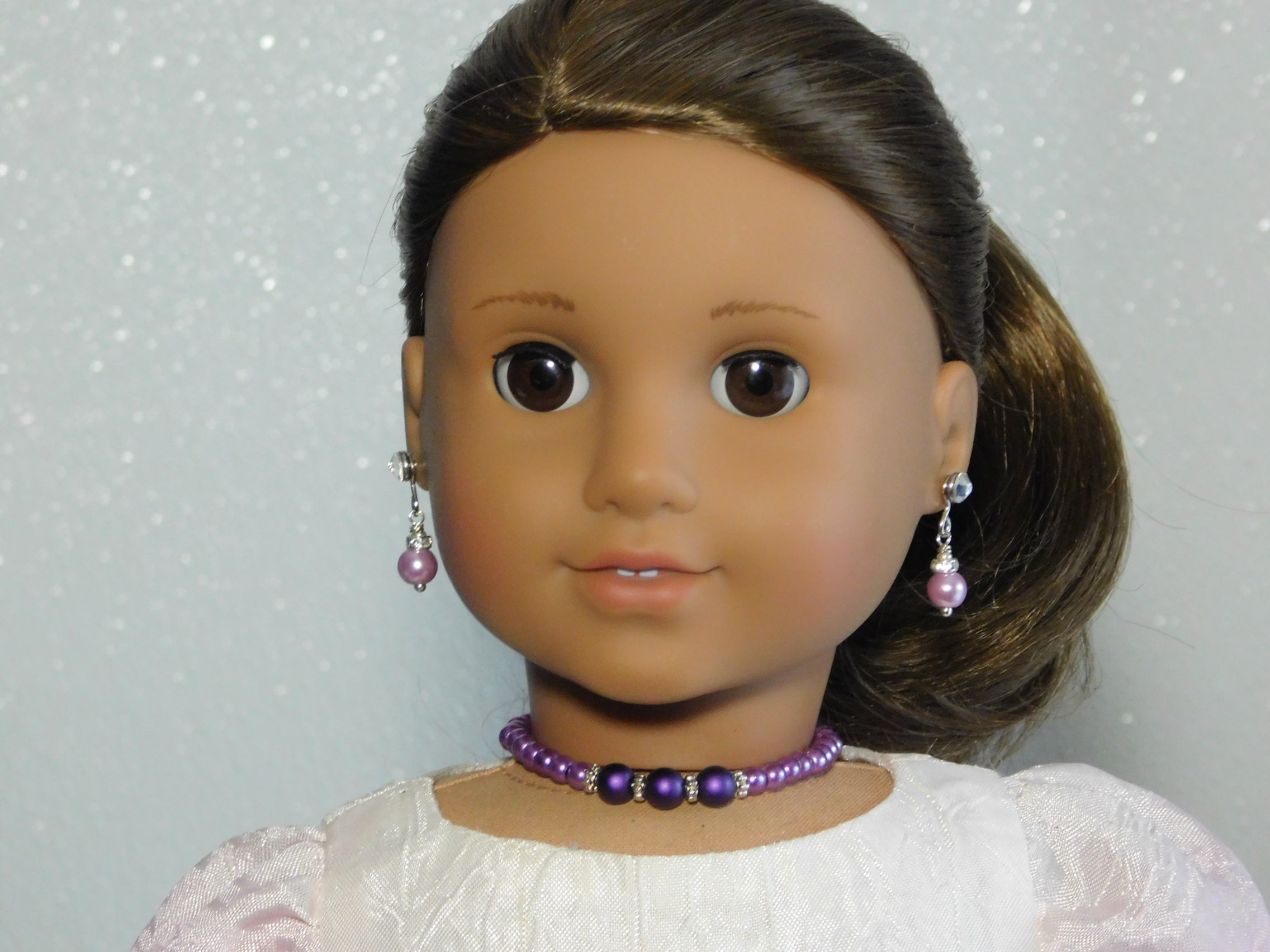 18 inch doll wearing a Bold Purple Pearl Necklace