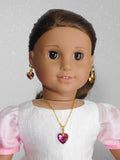 An 18 inch doll wearing a Dark Pink Crystal Heart Pendant and Earrings