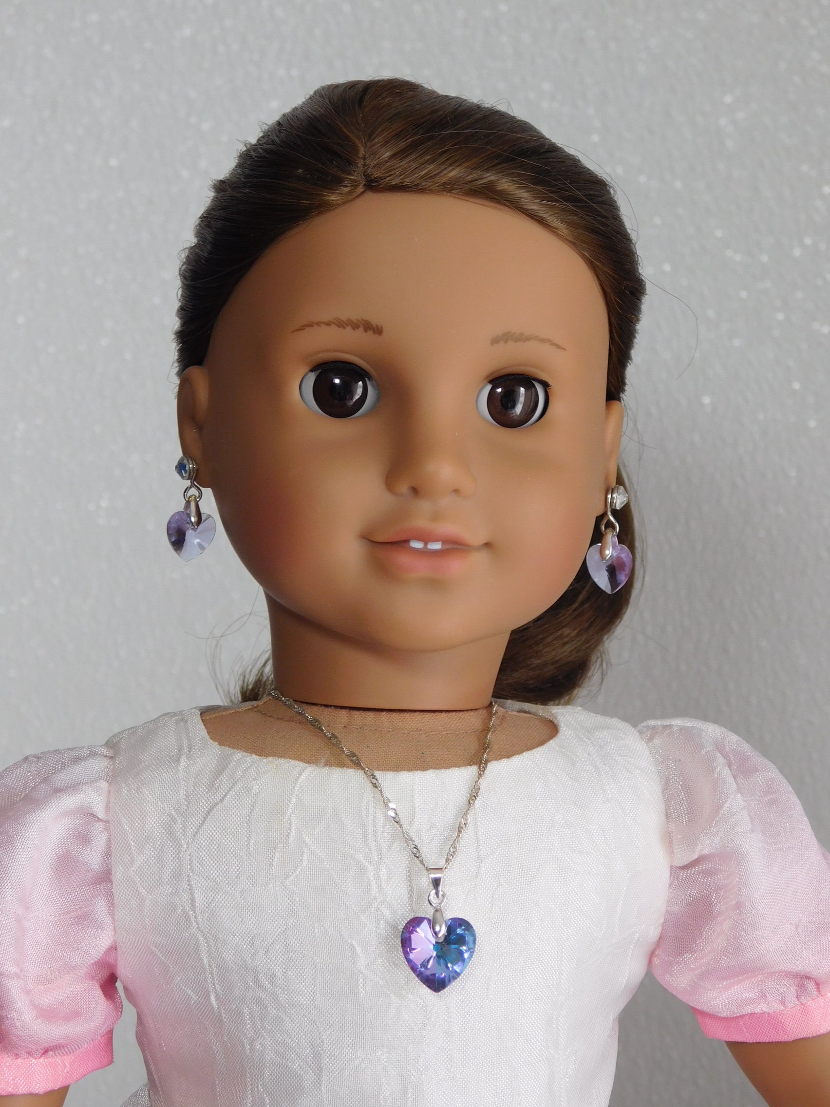 18 inch doll wearing a Lavender Crystal Heart Pendant and Earrings