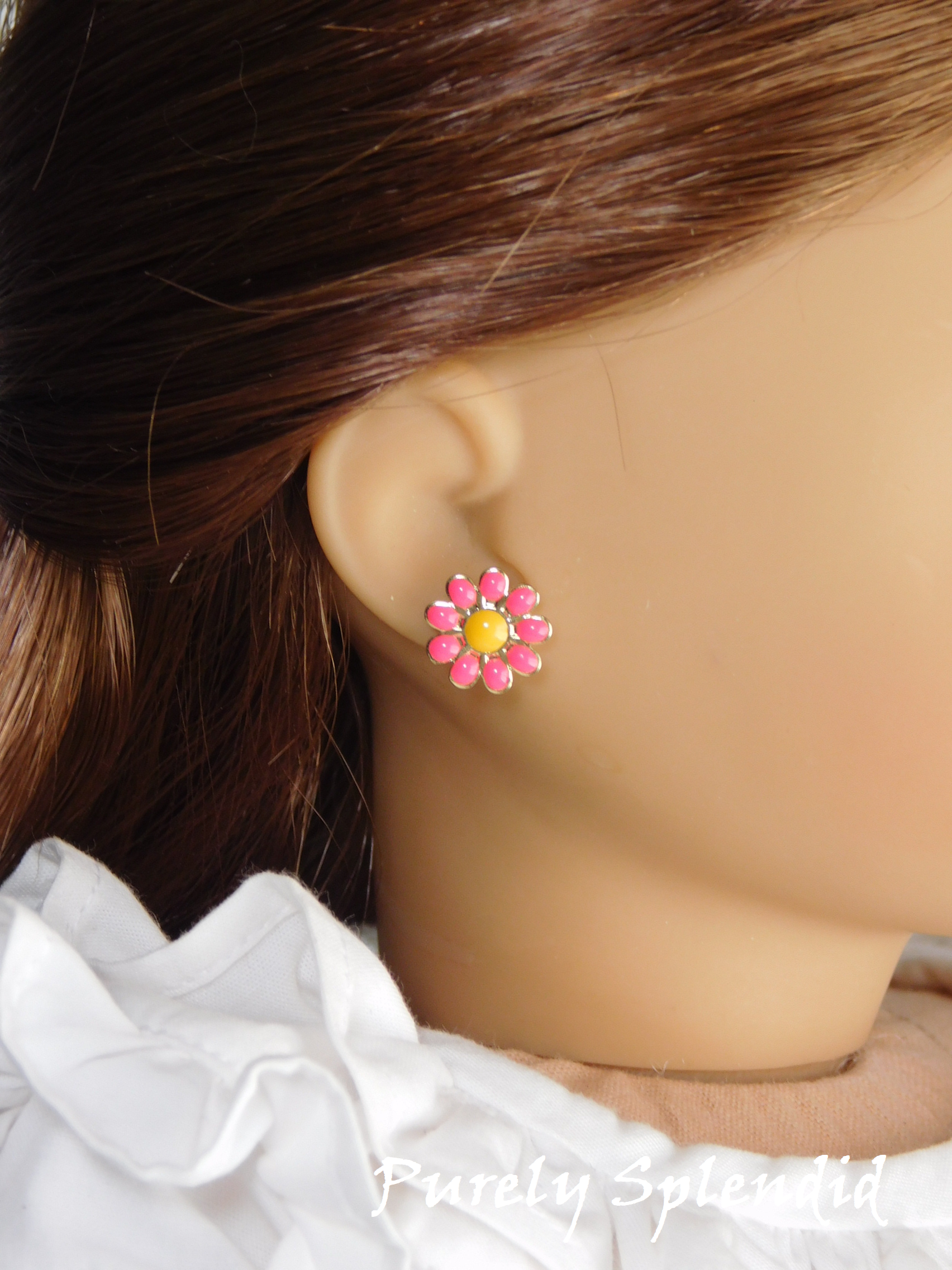 18 inch girl doll wearing dark pink daisy 2mm stud earrings with dark yellow centers American made | Purely Splendid
