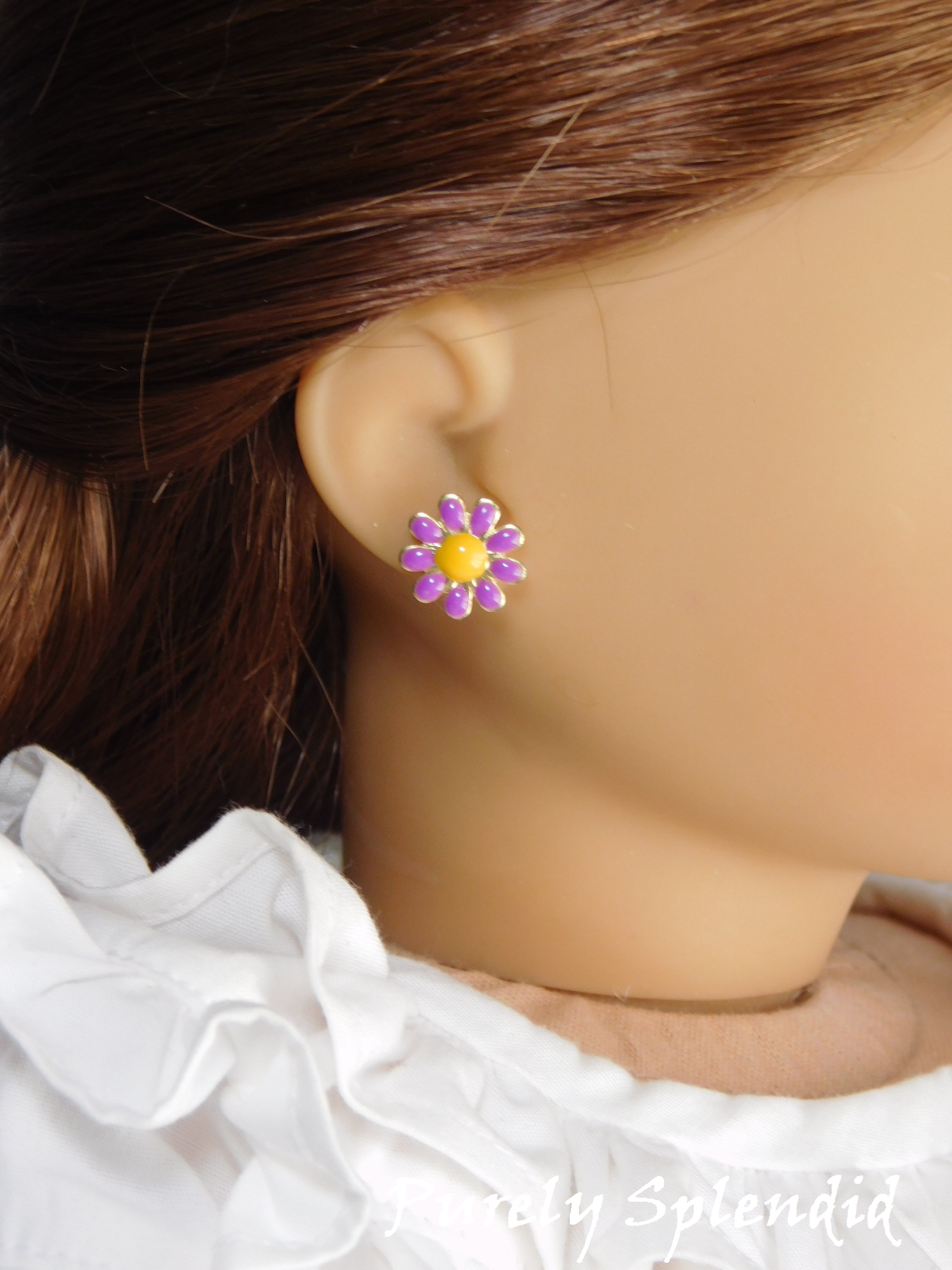 18 inch girl doll wearing purple daisy 2mm stud earrings with dark yellow centers
American made | Purely Splendid