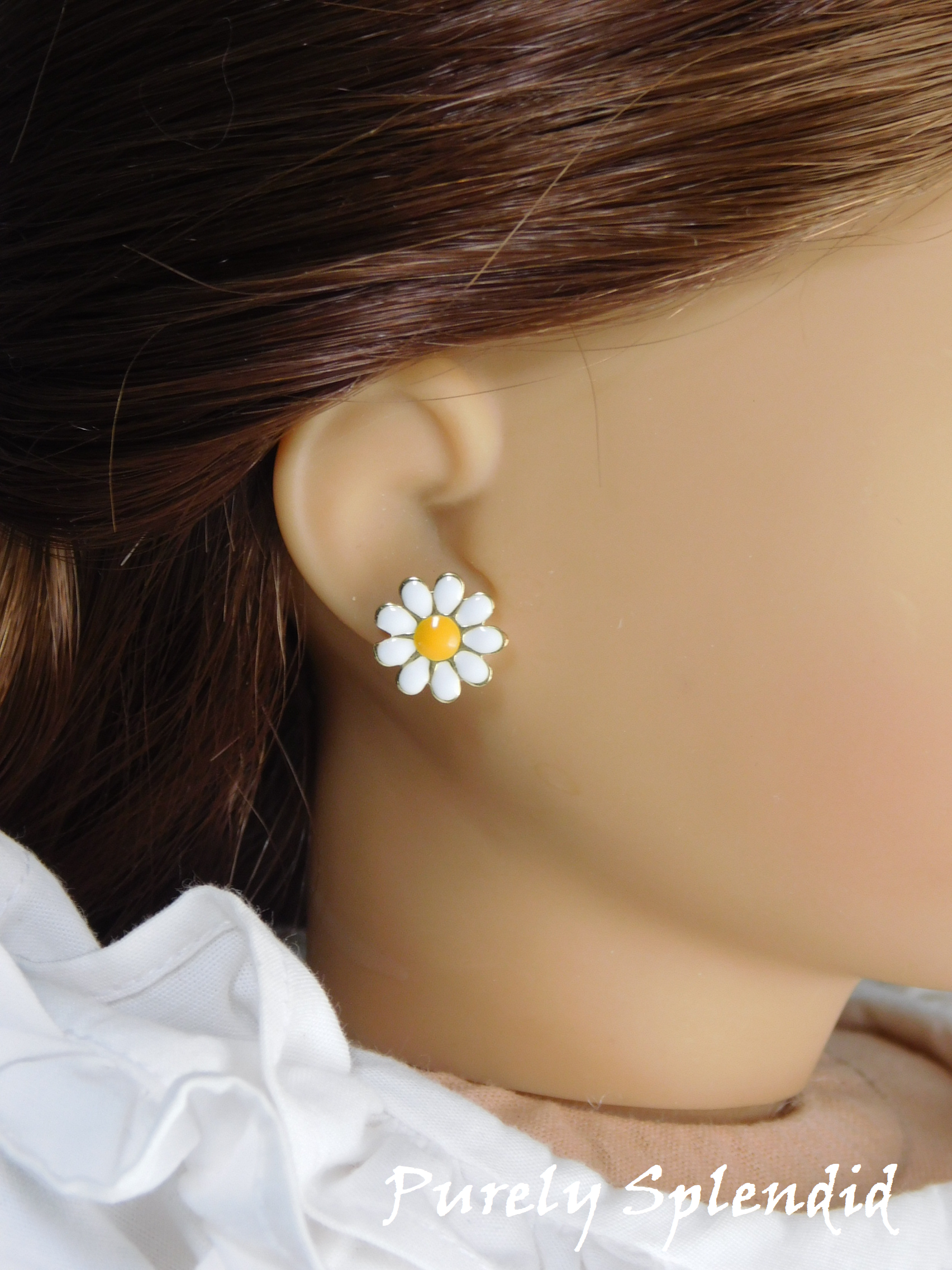 18 inch girl doll wearing white daisy 2mm stud earrings with dark yellow centers
American made | Purely Splendid