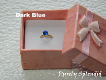 Load image into Gallery viewer, Dark Blue colored crystal on a gold band
