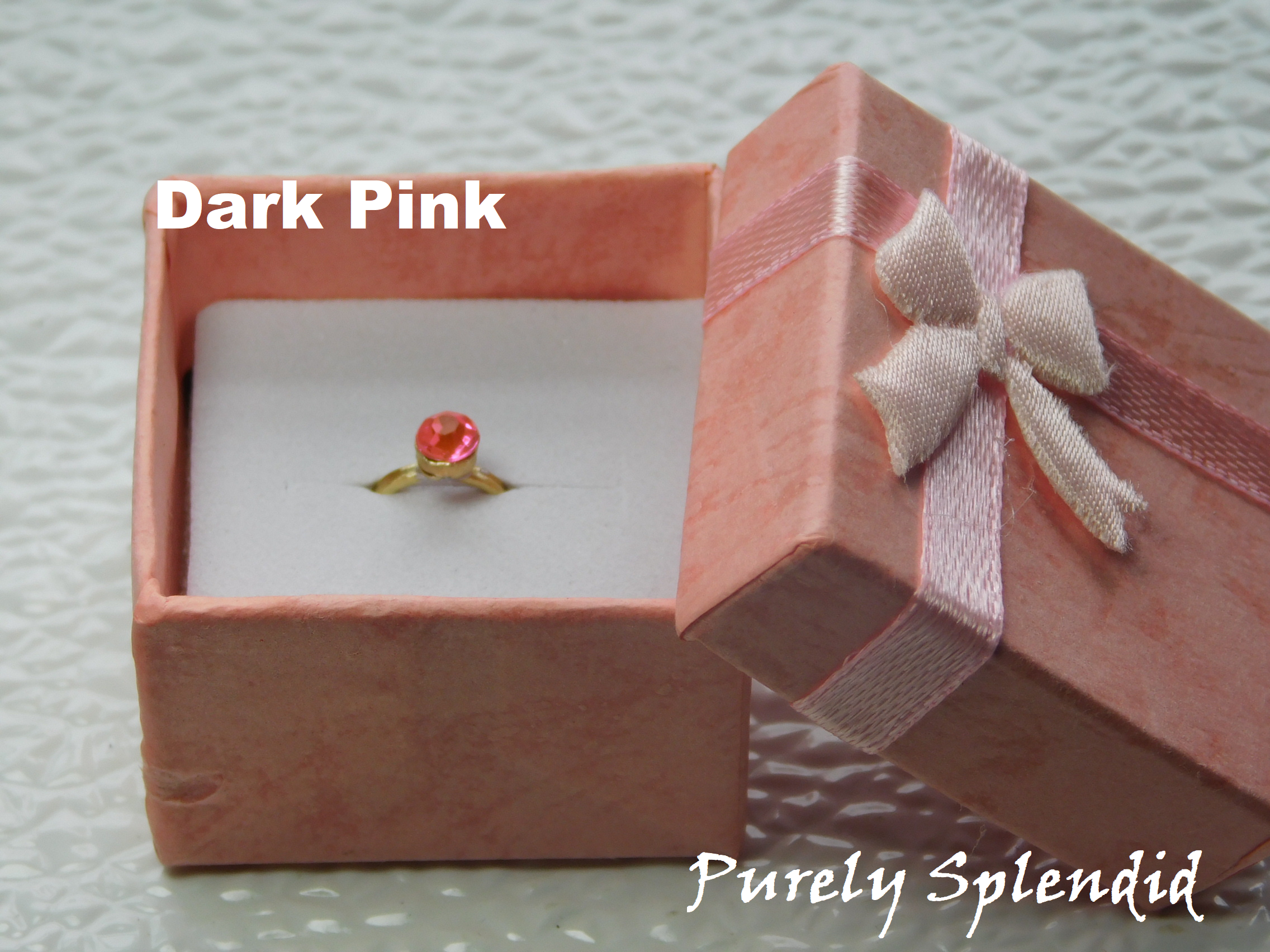 Dark Pink crystal on a gold band