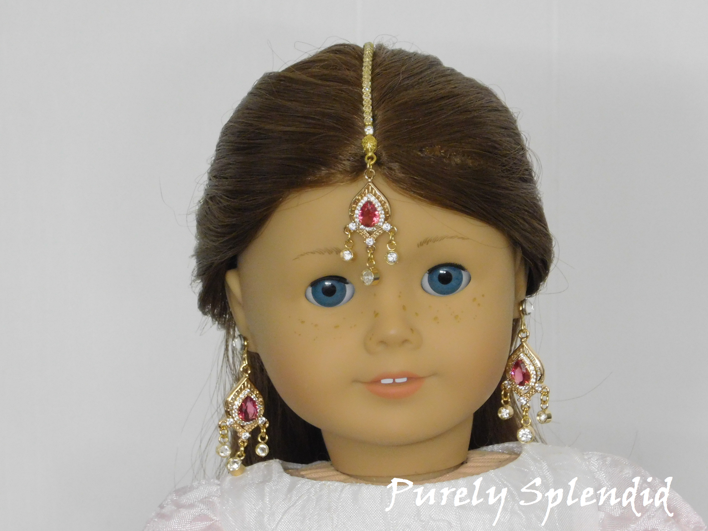 18 inch doll shown wearing a Rose Maang Tikka with matching earrings