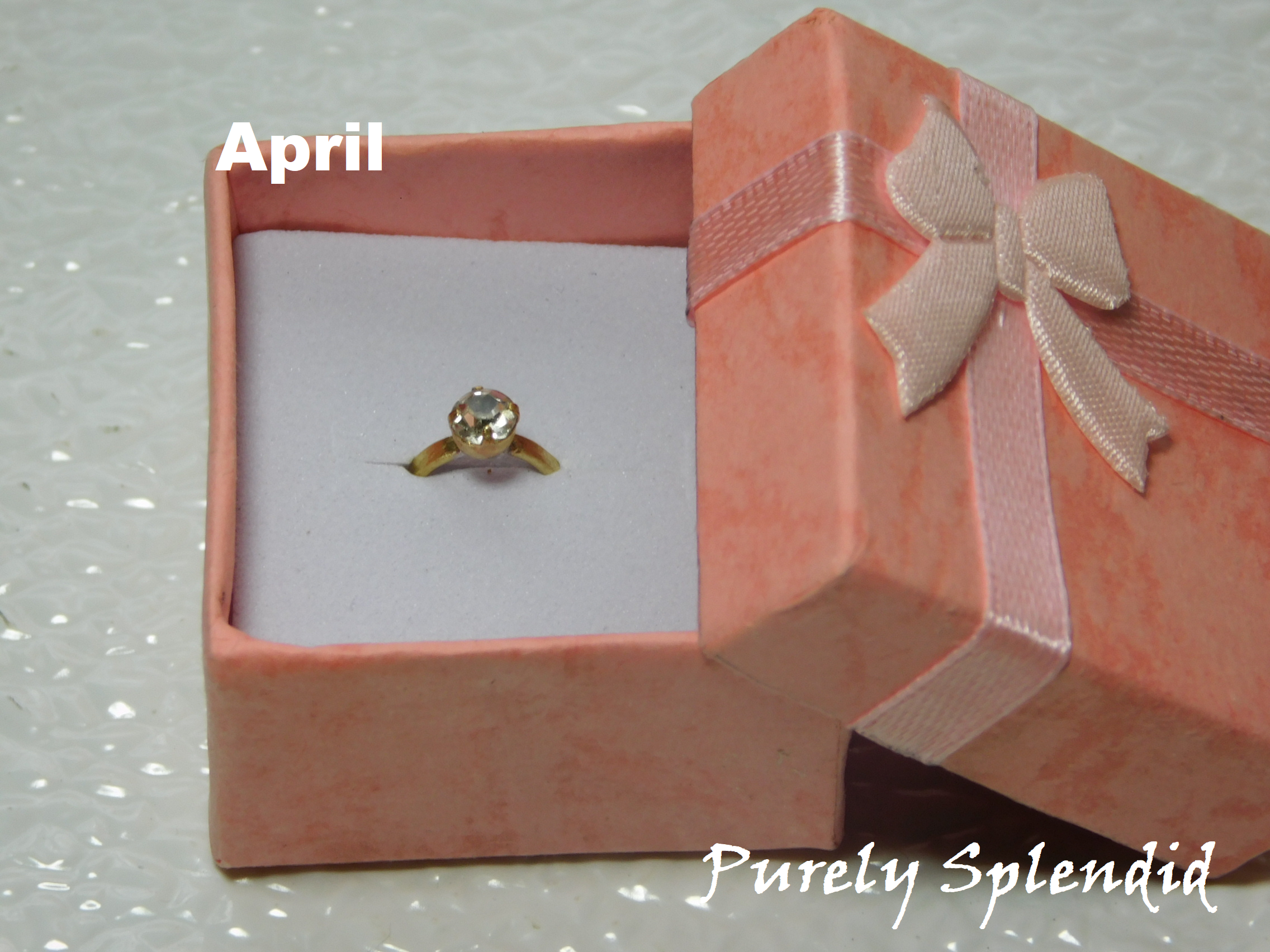 April Birthstone Ring - clear crystal on a gold band
