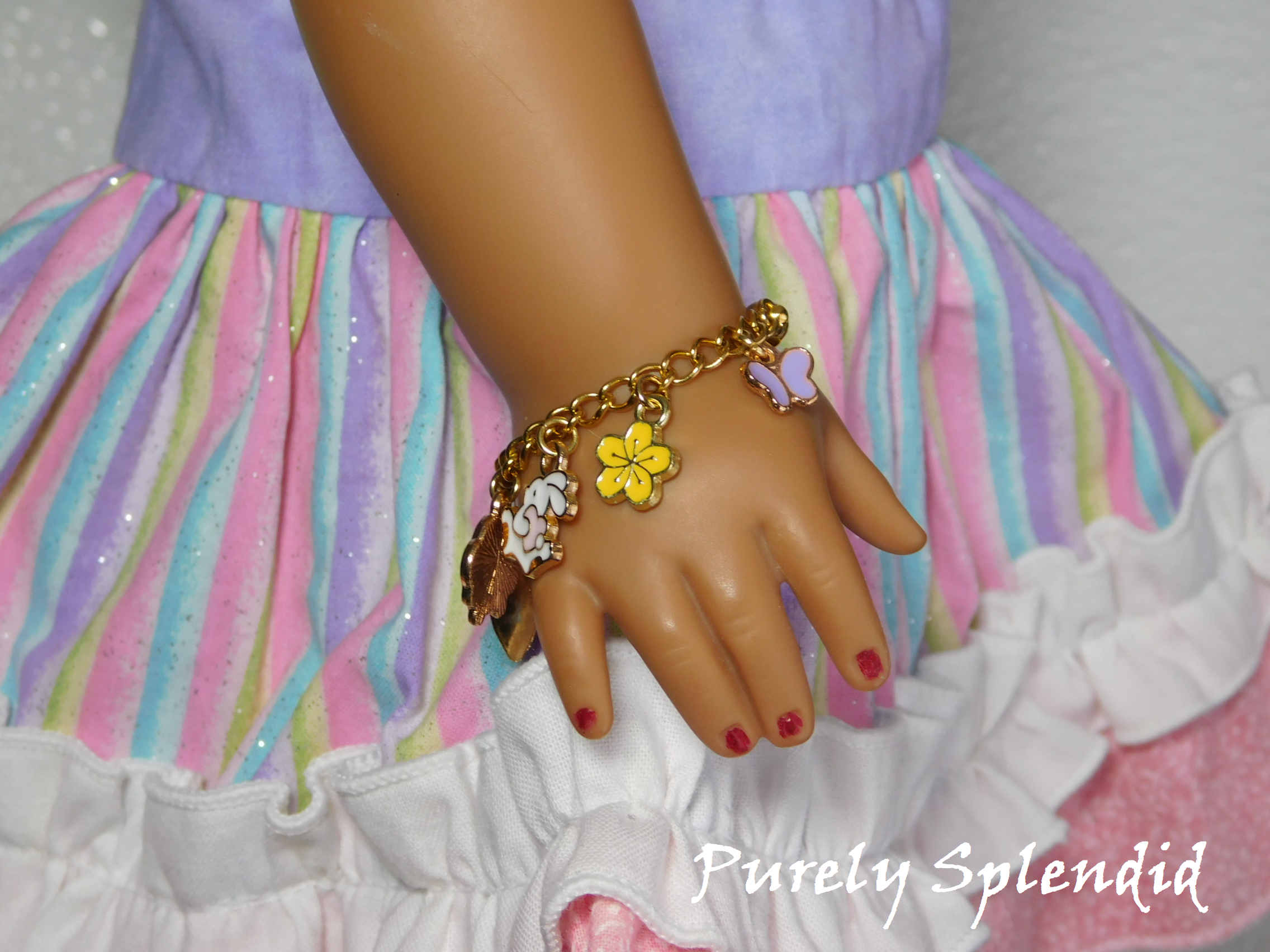 Easter Charm Bracelet for 18 inch dolls with Easter bunny, yellow flower and pale purple butterfly charms