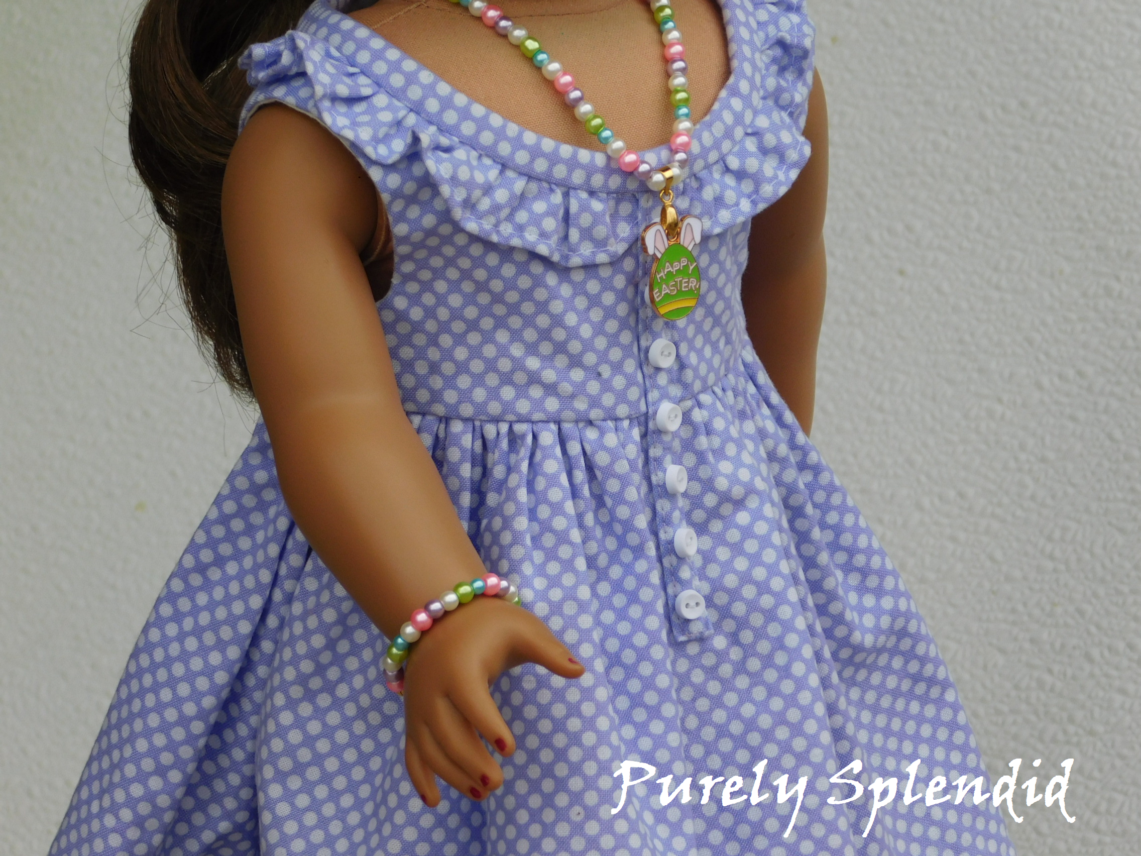 18 inch doll shown wearing the Easter Pearl Bracelet as well as the matching Easter Pearl Necklace with Pendant