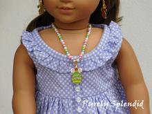 Load image into Gallery viewer, 18 inch doll shown wearing the Easter Pearl Necklace with Easter Egg center pendant
