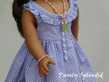 Load image into Gallery viewer, 18 inch doll shown wearing the Easter Pearl Necklace with Easter Egg Pendant and Easter Pearl Bracelet
