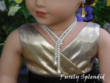 Load image into Gallery viewer,  Flapper Pearl Necklace wrapped around the neck twice of an 18 inch doll
