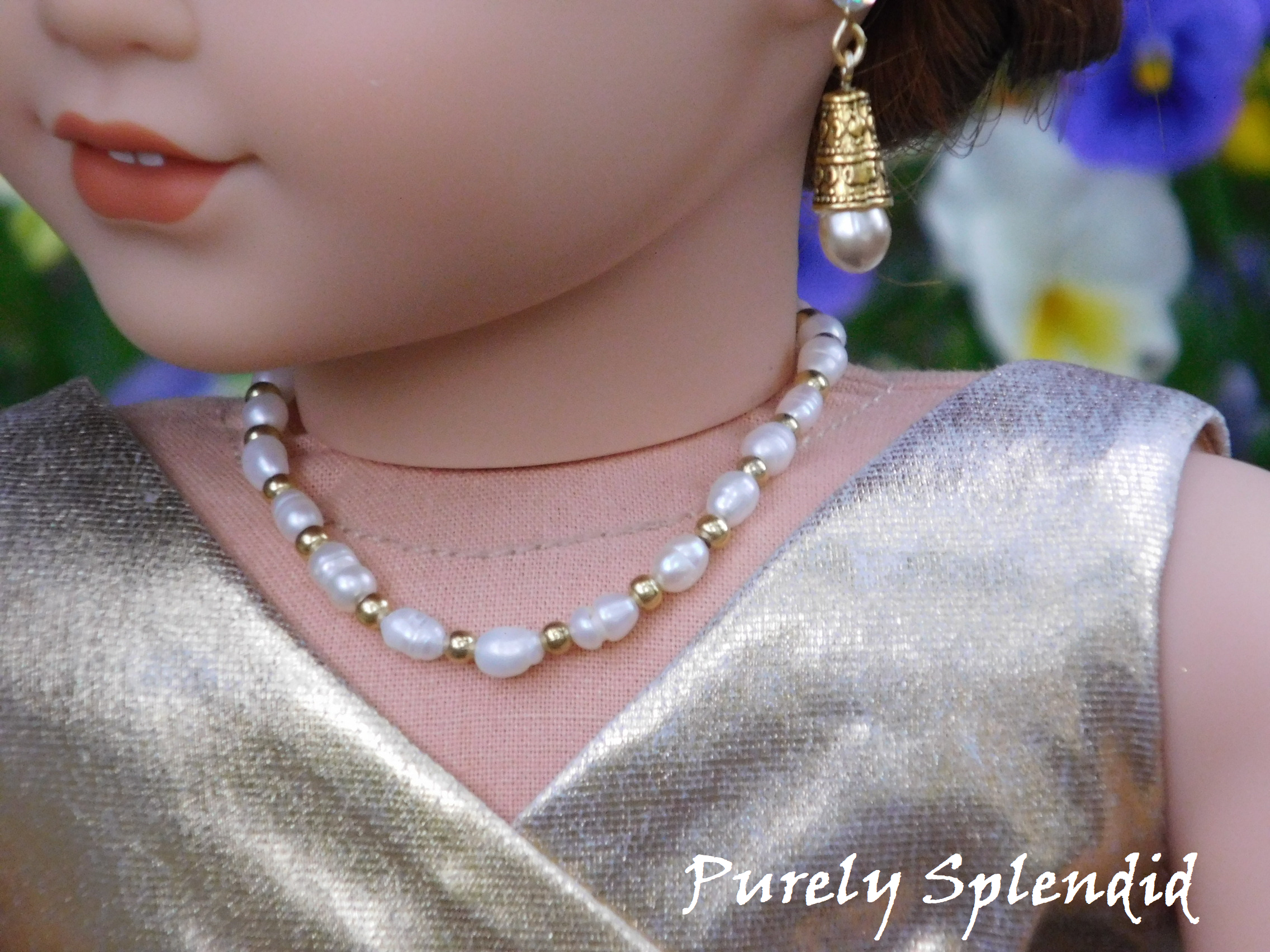 Rice sized Freshwater Pearls with gold colored beads inbetween 