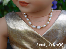Load image into Gallery viewer, Dainty rice sized Freshwater Pearls and gold colored beads make up this beautiful necklace
