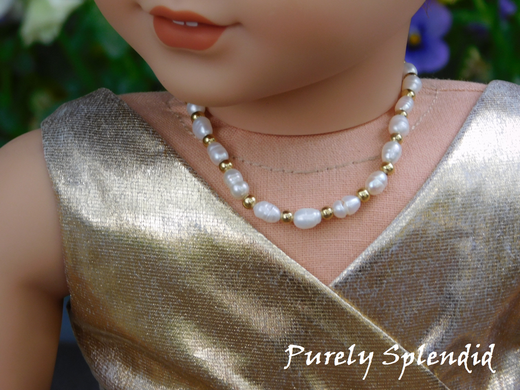 Dainty rice sized Freshwater Pearls and gold colored beads make up this beautiful necklace