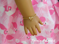 Sparkling bow bracelet with cubic zirconia on gold chain for 18 inch girl doll | American made | Purely Splendid