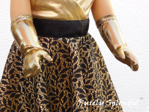 18 inch doll shown wearing a pair of Gold Shimmer Gloves