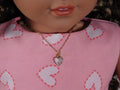 18 inch doll wearing a Gold Sparkling Heart Necklace